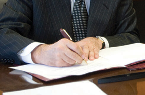 Person signing a document