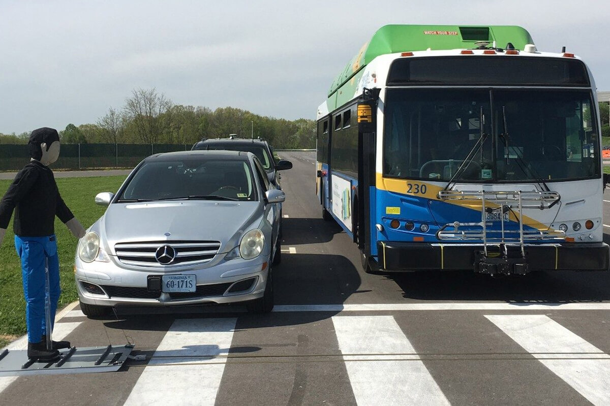 Bus and cars at a pedestrian crossing