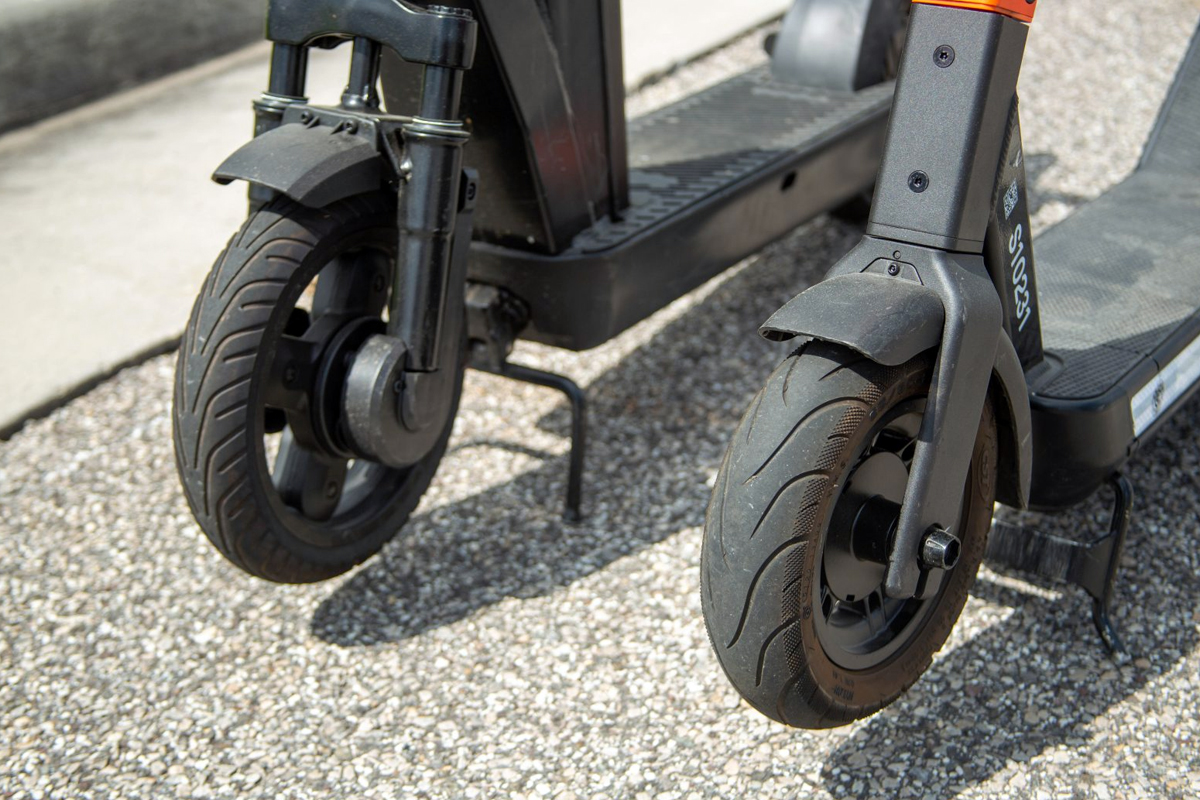 Two e-scooter wheels side-by-side