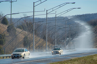 Weather towers on the Highway Section of the Virginia Smart Roads producing rain